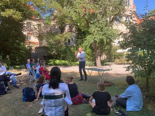 Christof Mauch while giving his keynote, which was moved to the garden due to the warm weather.